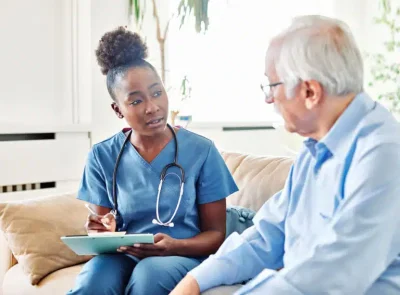 Nurse consulting with patient